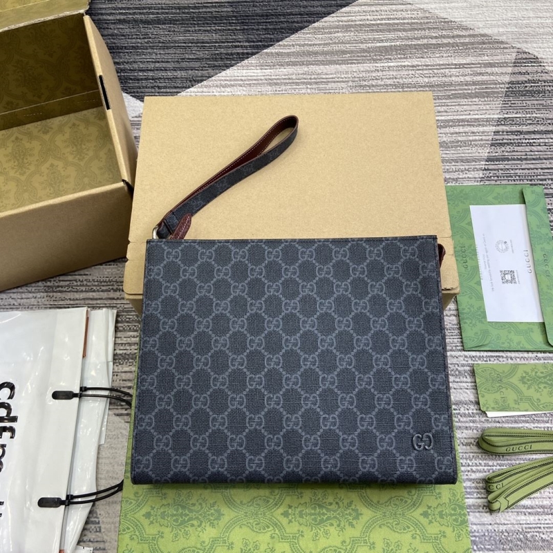 G*u*i clutch bags